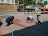 Die Schläuche werden wieder im Tragekorb verstaut.